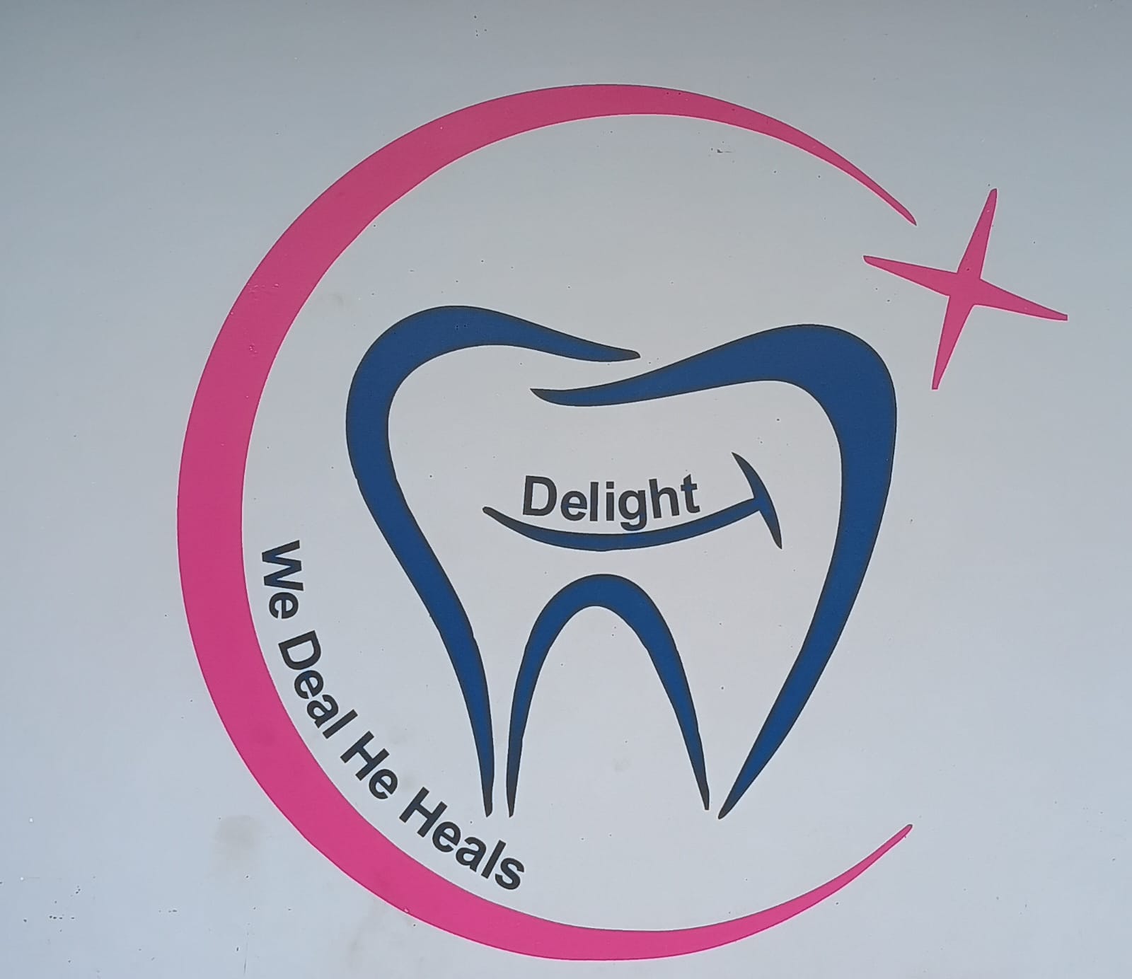 Delight Dental Care logo